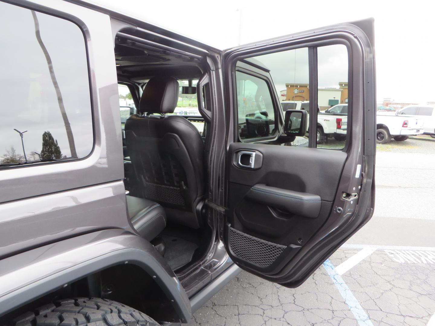 2021 CHARCOAL /BLACK Jeep Wrangler Unlimited Rubicon 4XE 4d SUV 4wd (1C4JJXR60MW) with an 2.0L L4 DOHC 16V TURBO engine, automatic transmission, located at 2630 Grass Valley Highway, Auburn, CA, 95603, (530) 508-5100, 38.937893, -121.095482 - 4XE Rubicon sitting on a Zone offroad suspension system, Fox shocks, 37" Toyo RT trail tires, 17" Method Race wheels, Teraflex Hd tire carrier, and Flat tow ready. - Photo#53